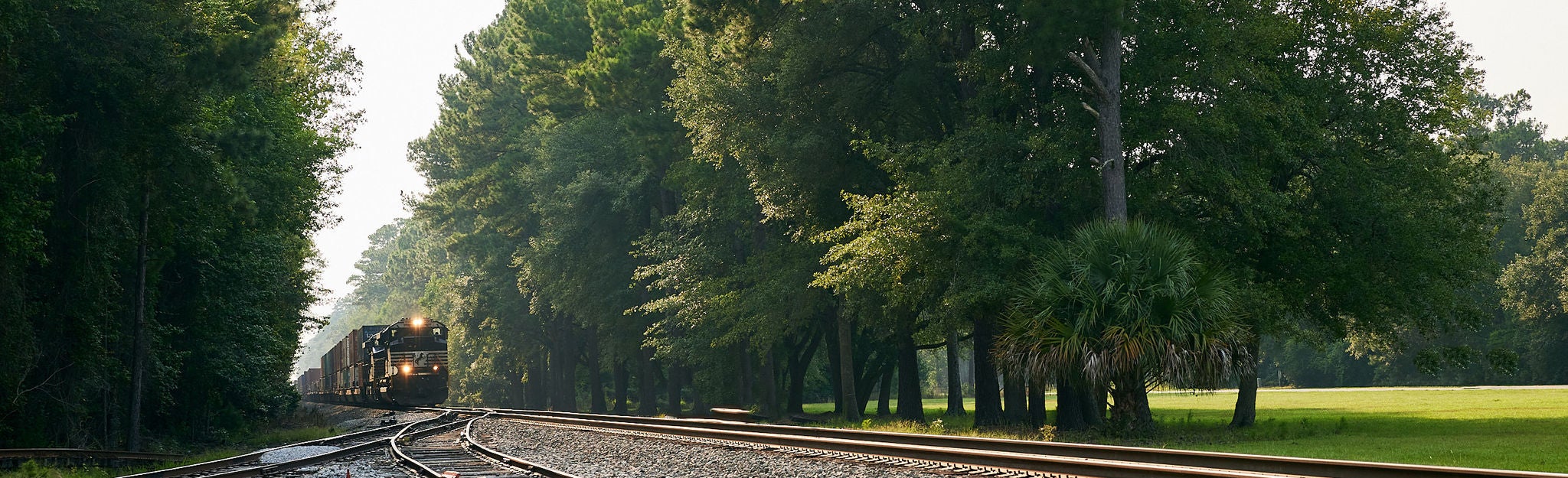 SlowZoneCommunityEvents_HERO Train coming through rural area