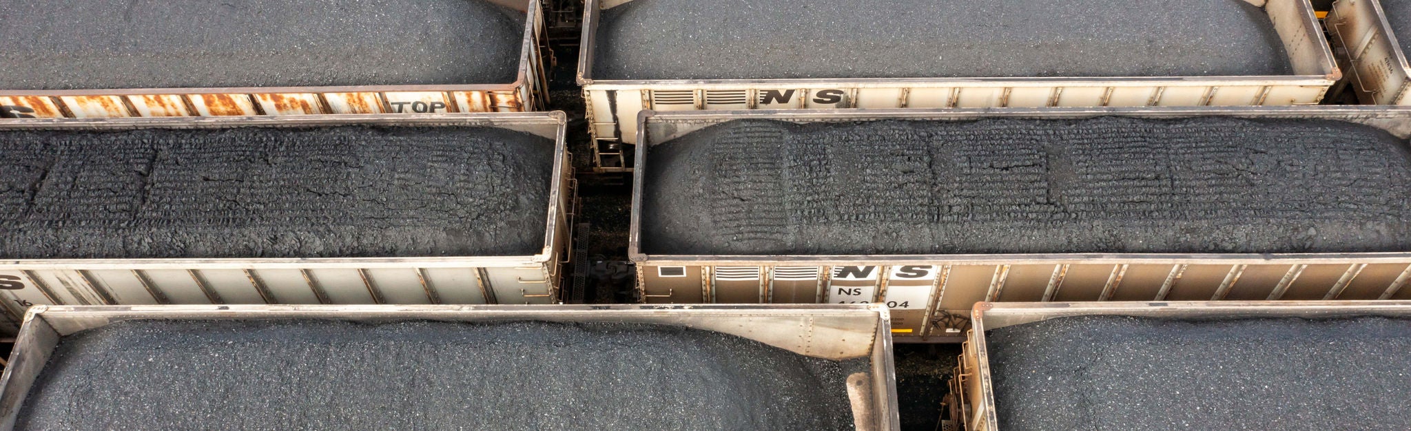 An aerial photo of Norfolk Southern coal cars ready for coal transportation.