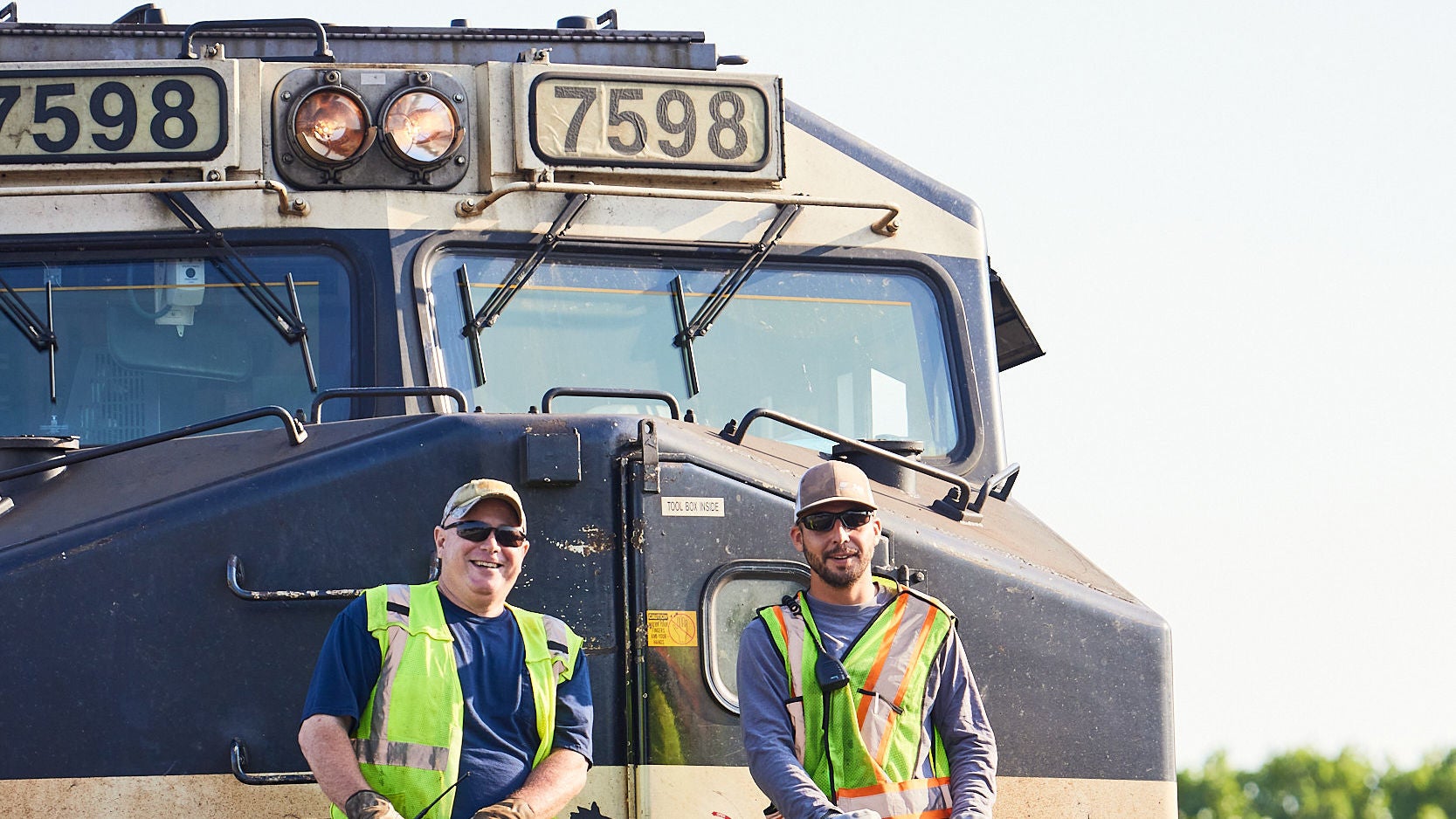 Workers on train putting safety first