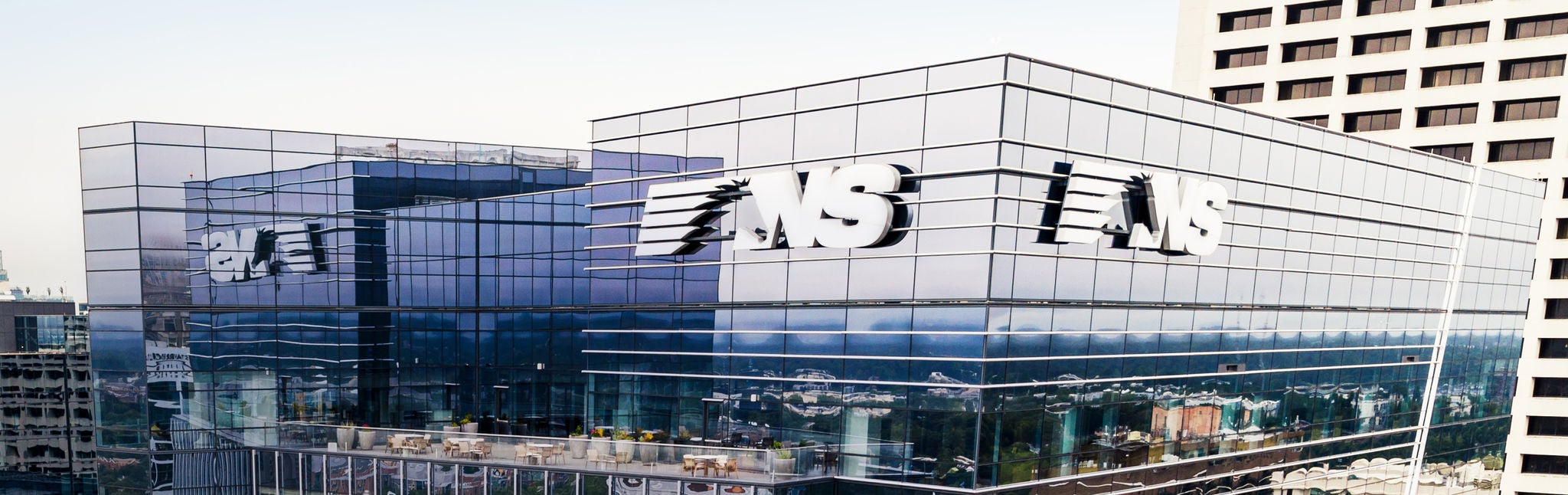 Aerial closeup of the Norfolk Southern symbol on the outside of the Norfolk southern building