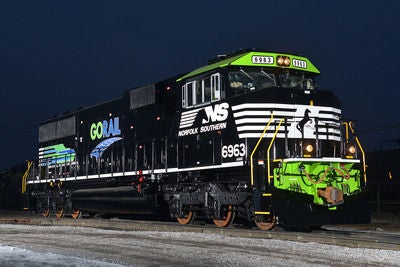 NS Locomotive 6963 rolls out of Norfolk Southern's Altoona paint shop sporting a unique livery that commemorates the 10th anniversary of GoRail, a non-profit organization dedicated to educating the public about the benefits of moving more freight by rail.  (PRNewsFoto/Norfolk Southern)