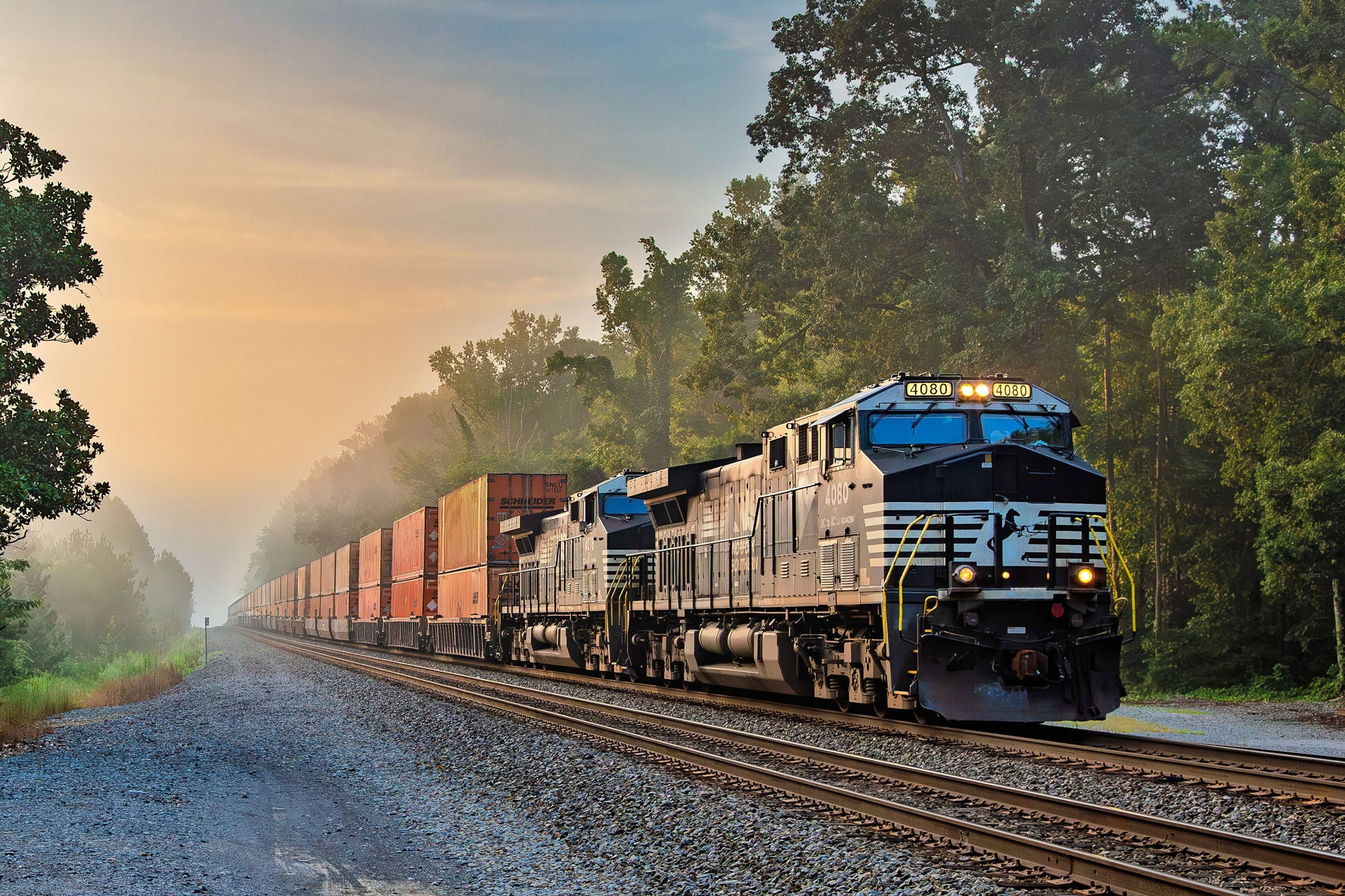 Norfolk Southern locomotive carrying Schneider containers