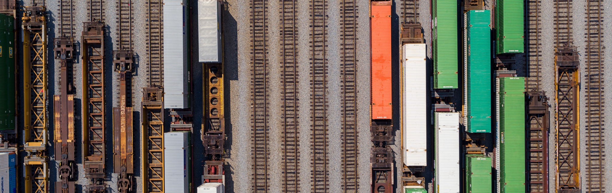 Aerial view of Norfolk Southern trains in a train yard shipping agricultural products or industrial forest products