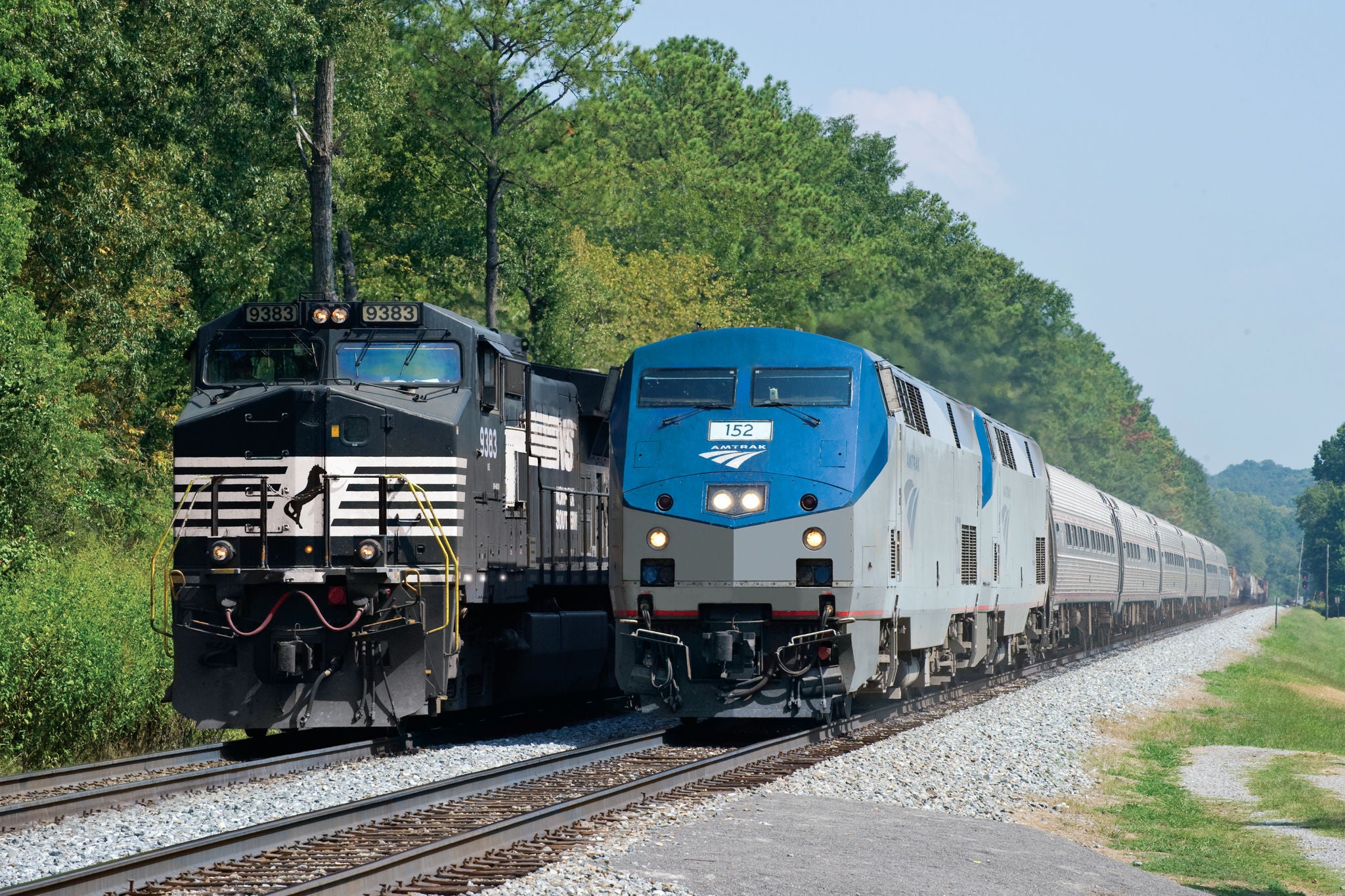 Norfolk Southern Locomotive and Amtrak train