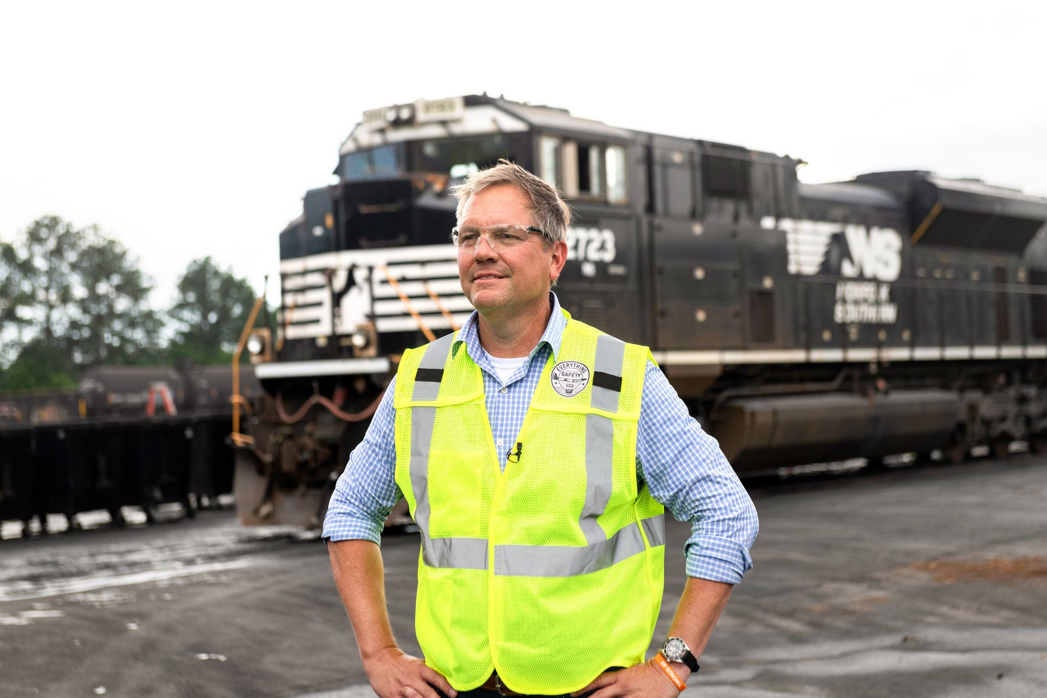Railroad Industry leader Norfolk Southern’s president Alan Shaw standing in front of a train