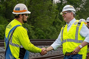 Norfolk southern transportation leaders shaking hand