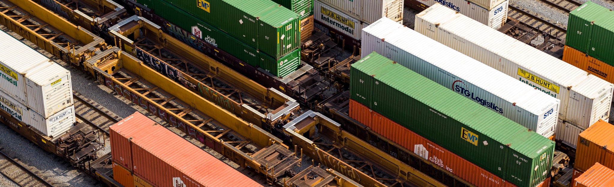 Multiple Norfolk Southern railway containers at an intermodal container terminal.