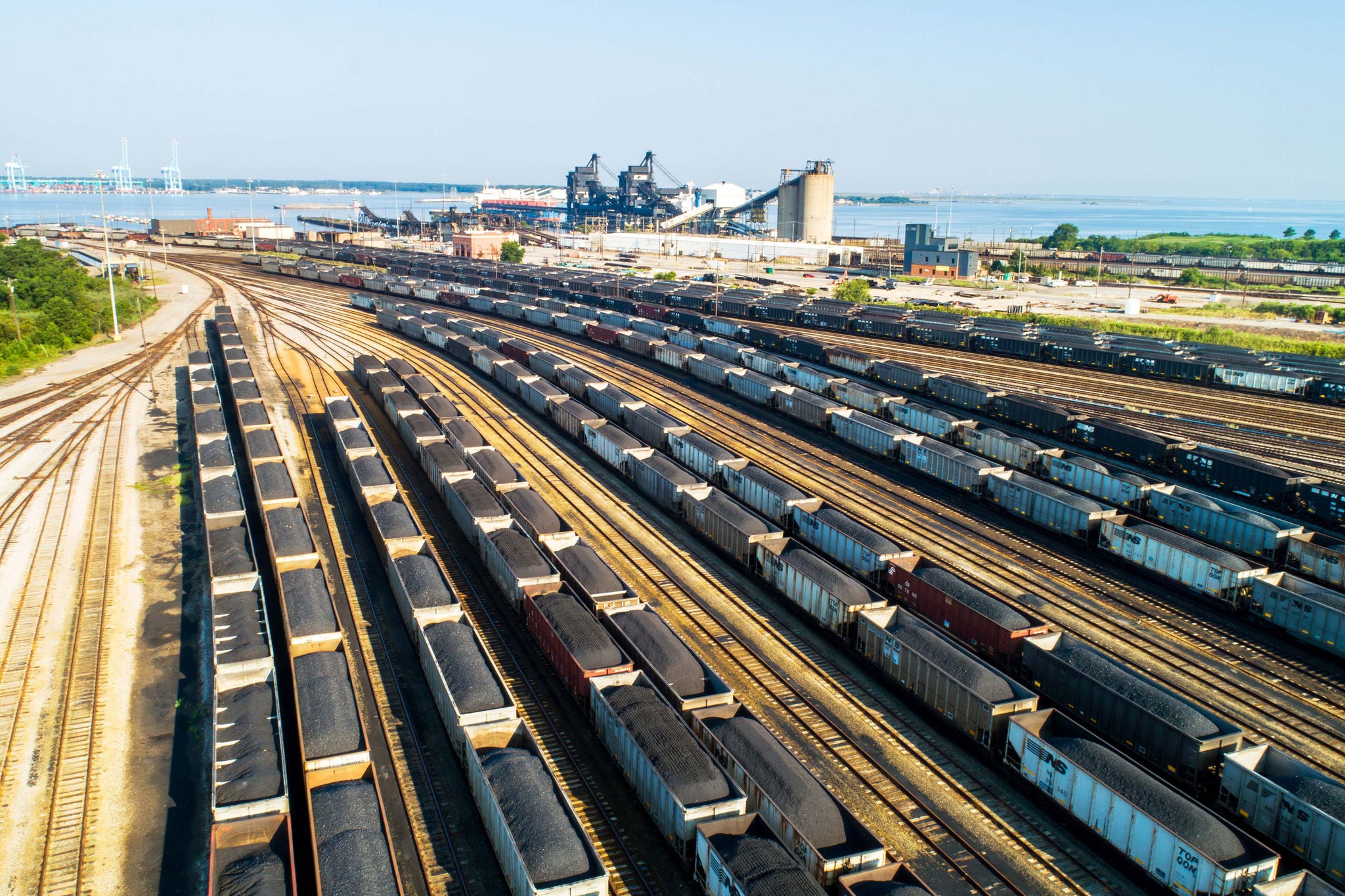 An aerial shot of intermodal transportation coal cars on Norfolk Southern railways at the ready for coal transportation and coal shipping.