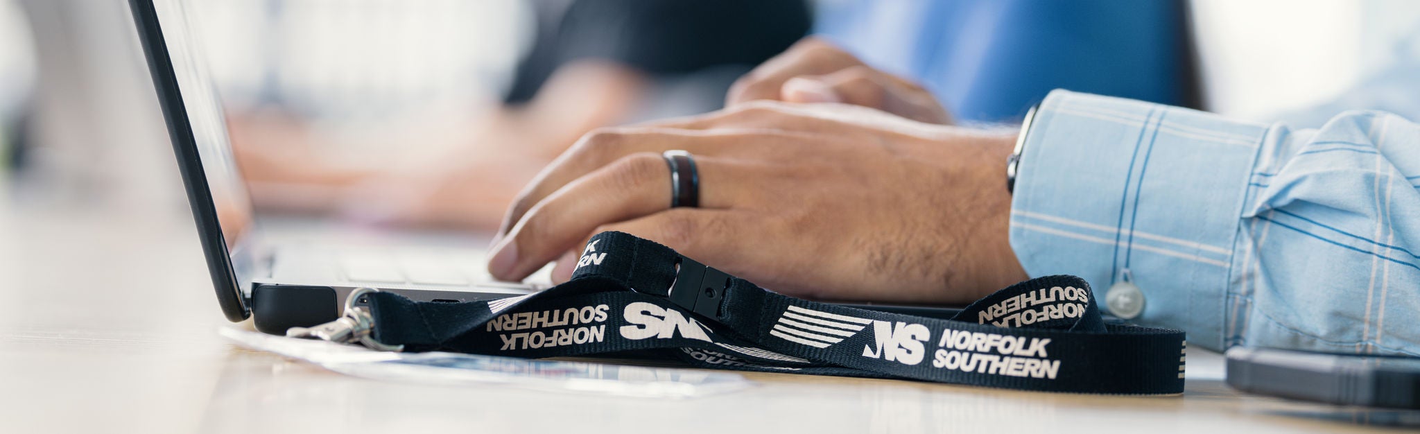 manage email subscriptions A customer’s hands signing up for customer email notifications.