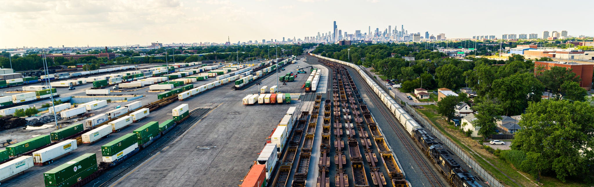 Large trainyard full of trains shipping metals Sunset at Lamberts Point Coal Docks