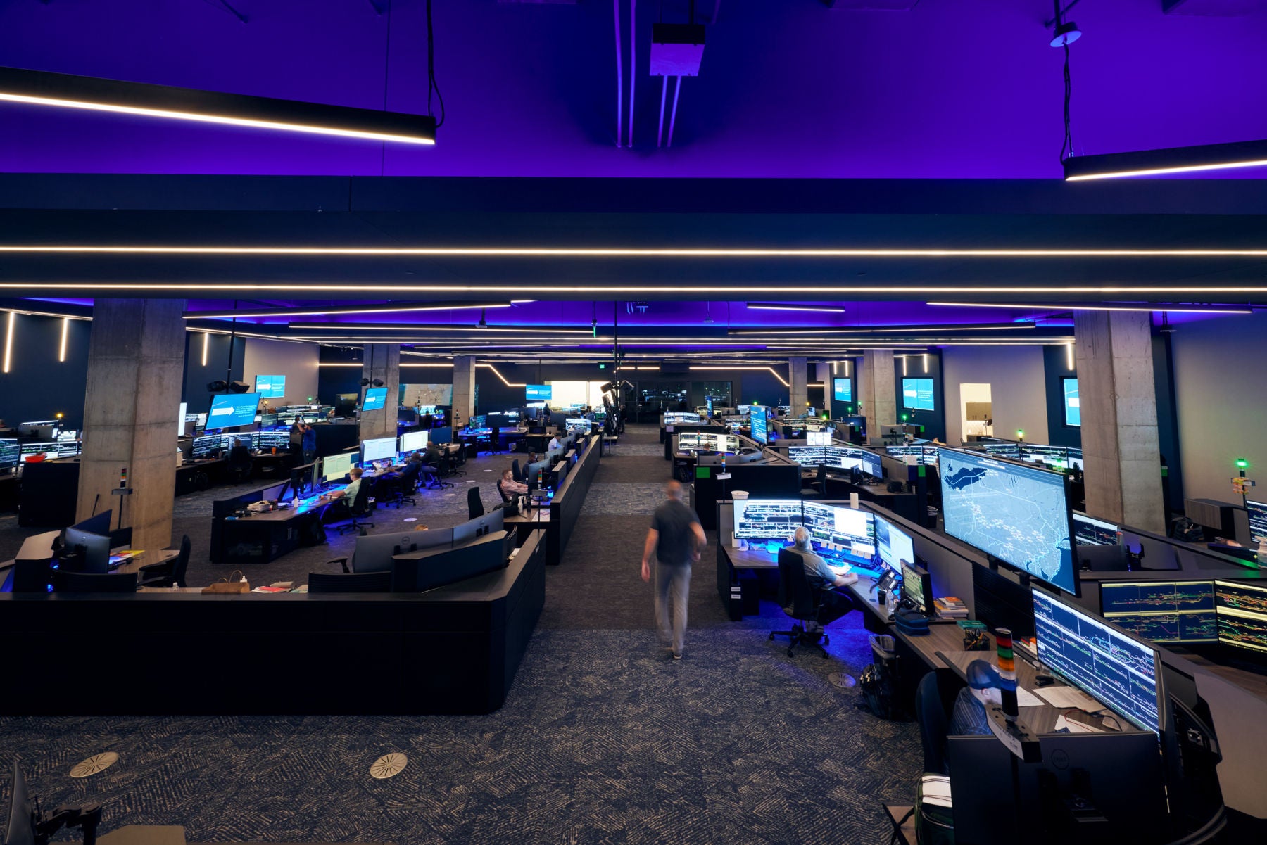 Employees hard at work inside the NOC