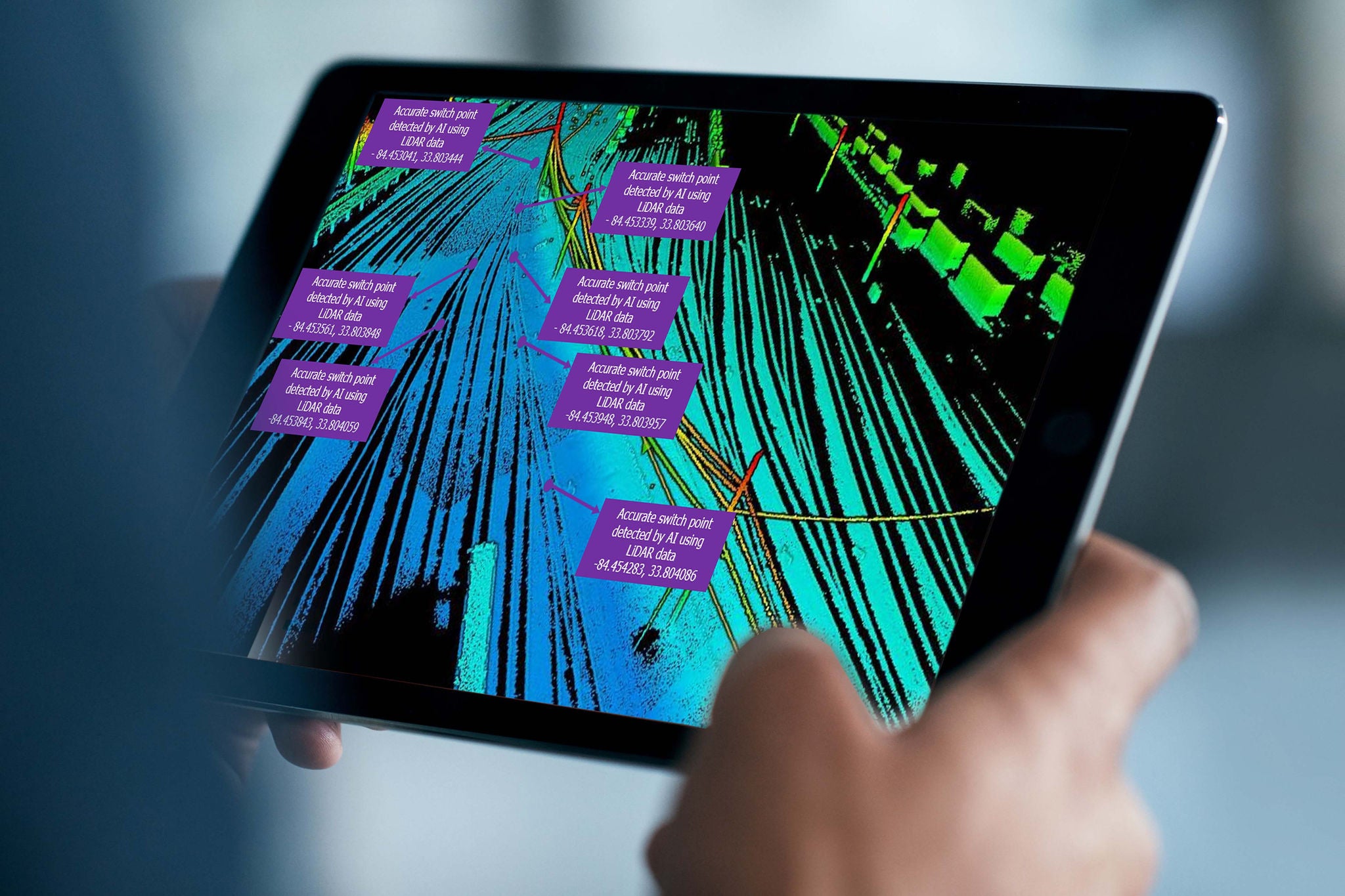  Close up of ipad showing ai-powered asset mapping safety technology 