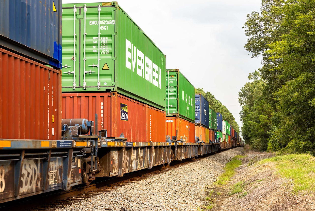 Norfolk Southern railcars transport freight on track
