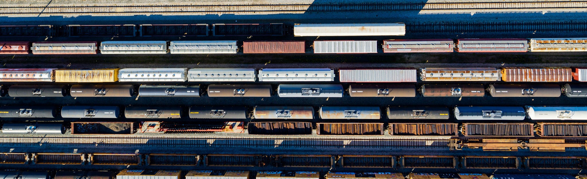 Rail cars of different types in a train yard