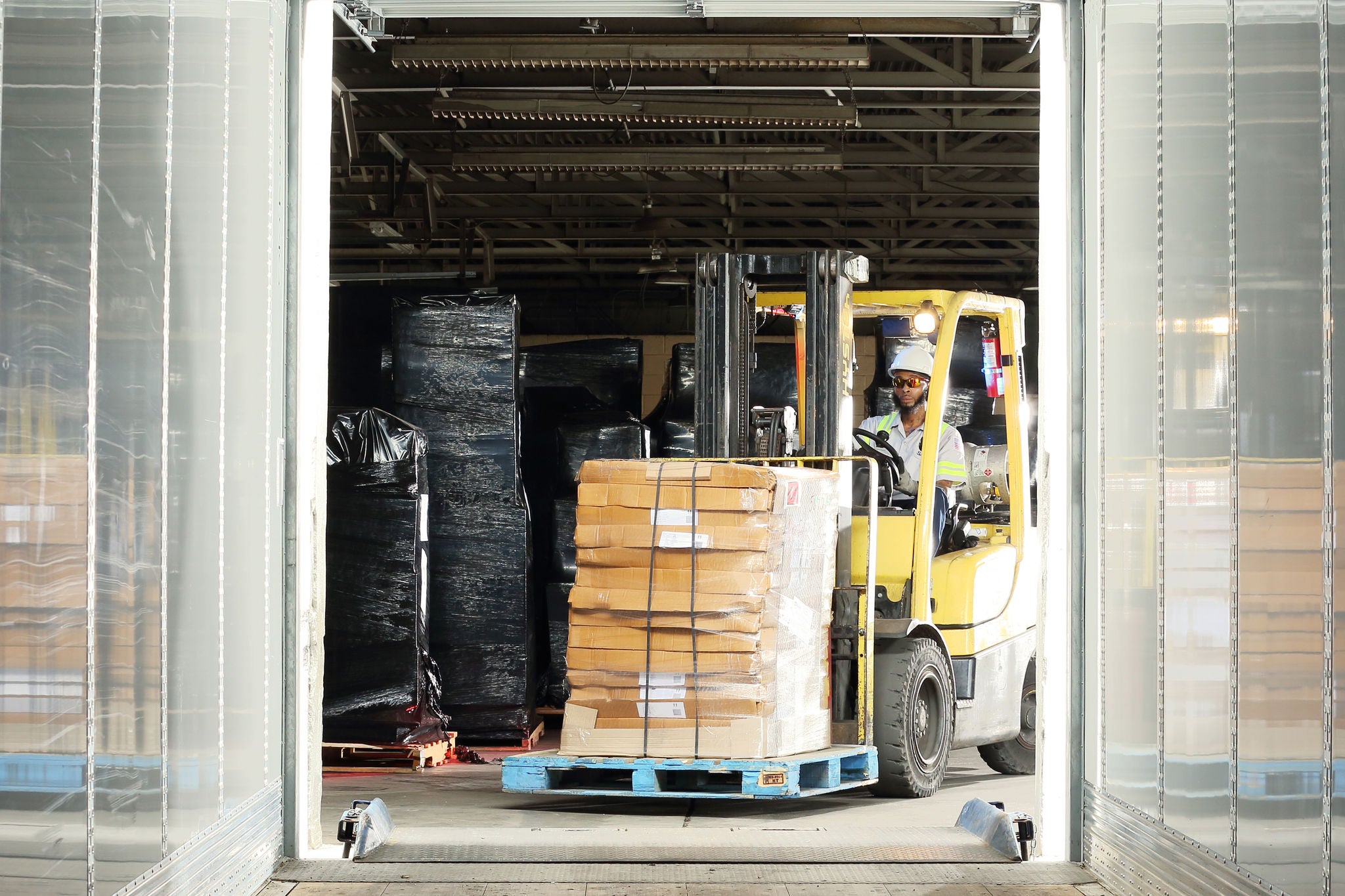 Employe transloading on forklift