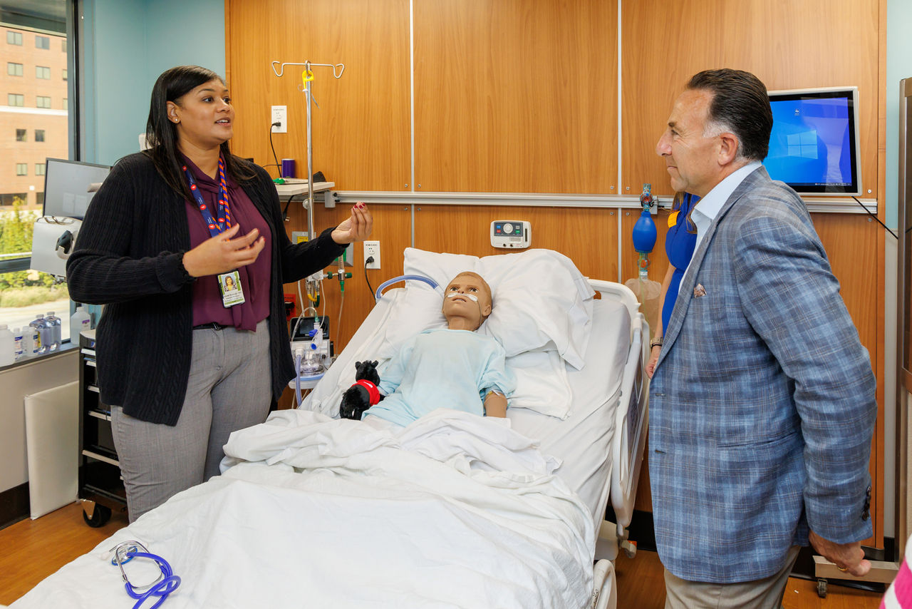 NS CEO Mark George with Children's of Alabama NICU employee