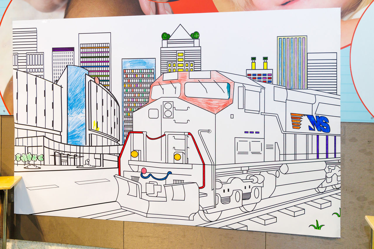 Coloring book page of a train