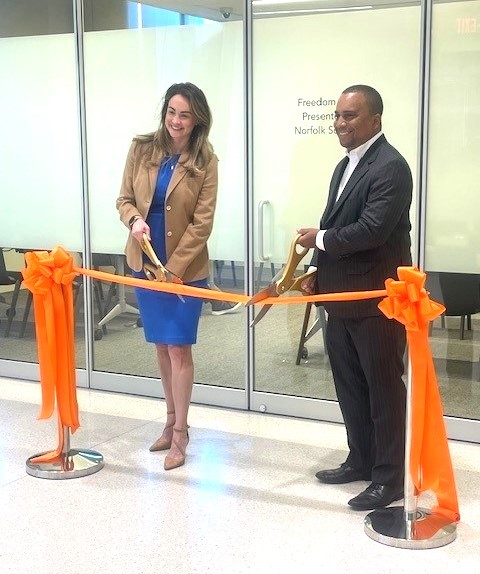 Kristin Wong and Nate Smith cut ribbon 