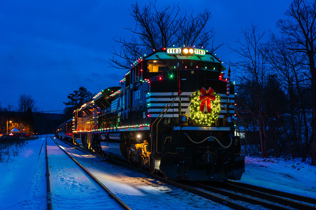 Norfolk Southern train decorated with holiday wreath