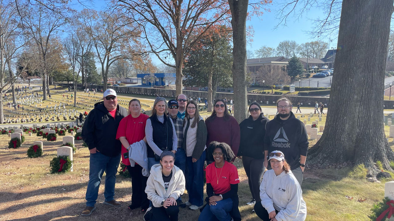 group of volunteers in cemetery
