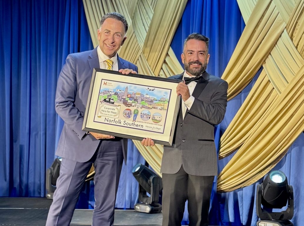 Mark George accepting Corporate Hero of the Year Award